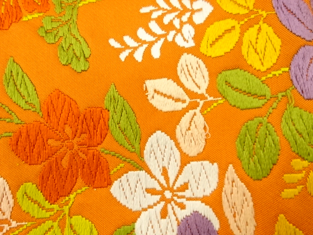  唐織秋草にヱ霞模様織出し袋帯